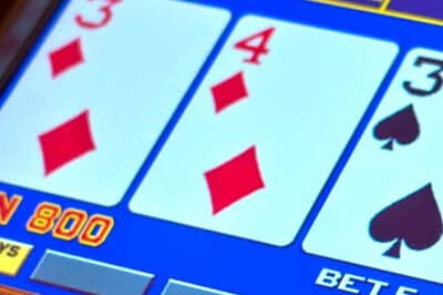 How do I play Video Poker?