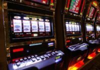 A row of slot machines insude a casino